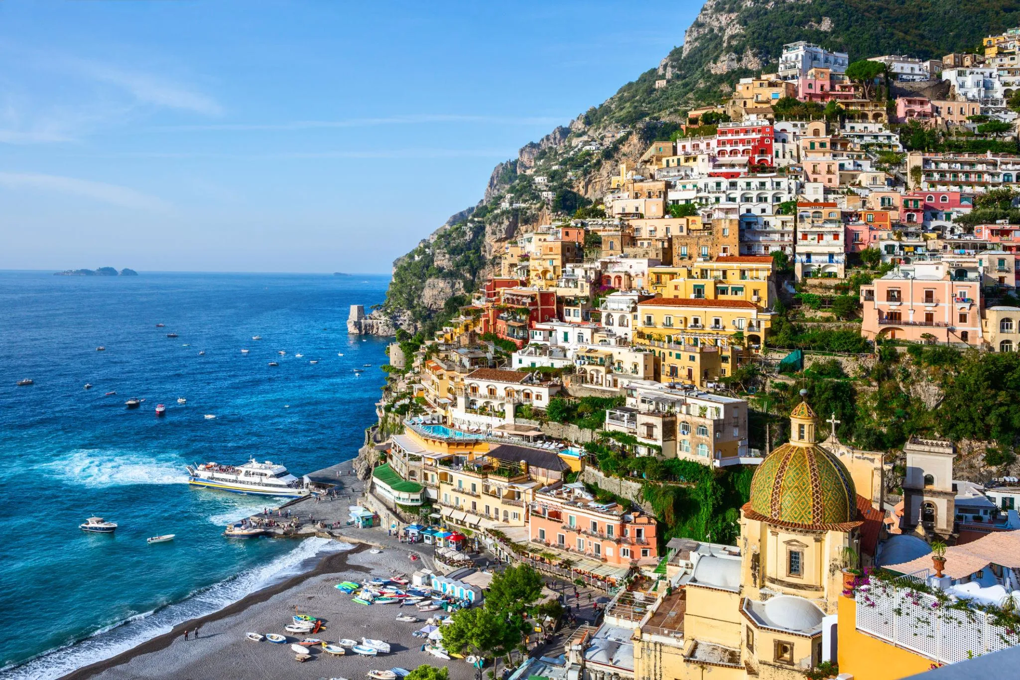 Pastel-colored village of Positano cascading down the cliffs of the Amalfi Coast, Italy